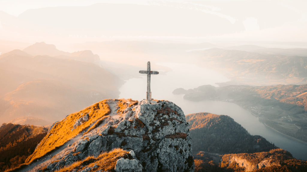 A cross on an alpine peak